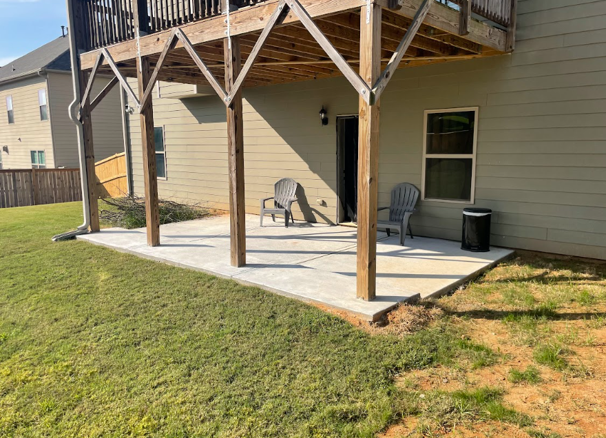 Newly installed concrete Patio in Lawrenceville, GA by Georgia Peach Concrete LLC. Expert concrete services for patios, driveways, sidewalks, and walkways.