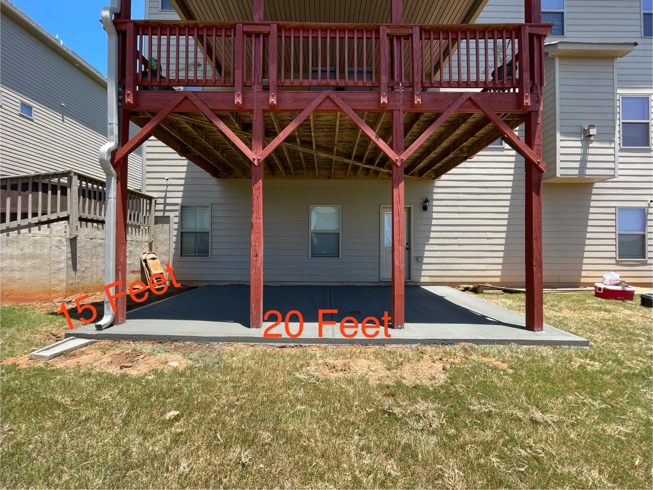 Newly installed concrete patio in Hoschton, GA by Georgia Peach Concrete LLC. Expert concrete services for patios, driveways, sidewalks, walkways, and more.