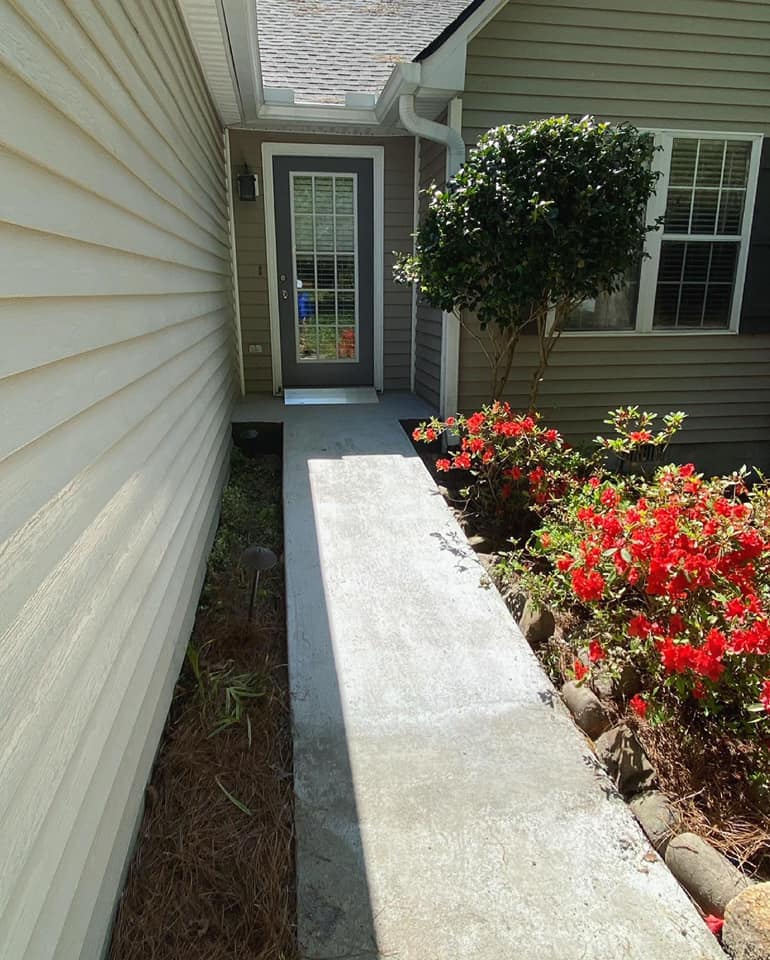 Newly installed concrete ramp in Winder, GA by Georgia Peach Concrete LLC. Expert concrete services for patios, driveways, sidewalks, walkways, and more.